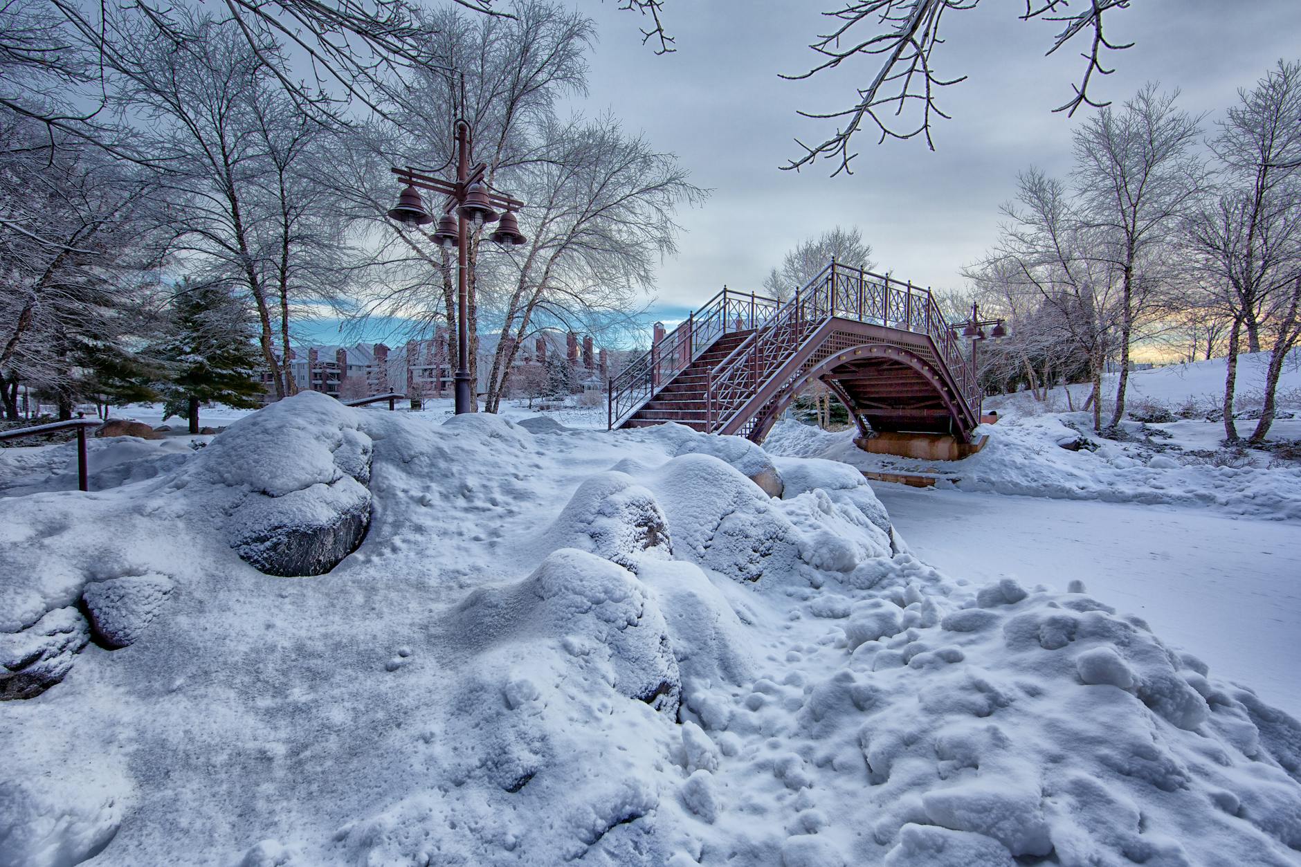 photo of bridge with white snow